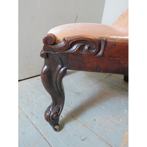 791 - A Victorian rosewood framed button back slipper chair with a scrolled back upholstered in a  light p... 