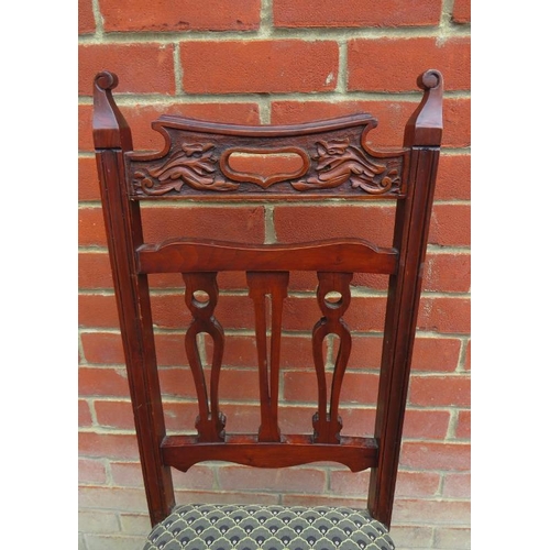 794 - A set of six Edwardian mahogany dining chairs upholstered in a patterned Art Deco style fabric, rais... 