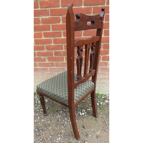 794 - A set of six Edwardian mahogany dining chairs upholstered in a patterned Art Deco style fabric, rais... 