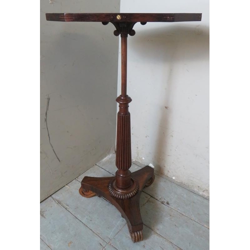 795 - An unusual Regency mahogany & rosewood height adjustable tea table, the octagonal top encircled by a... 