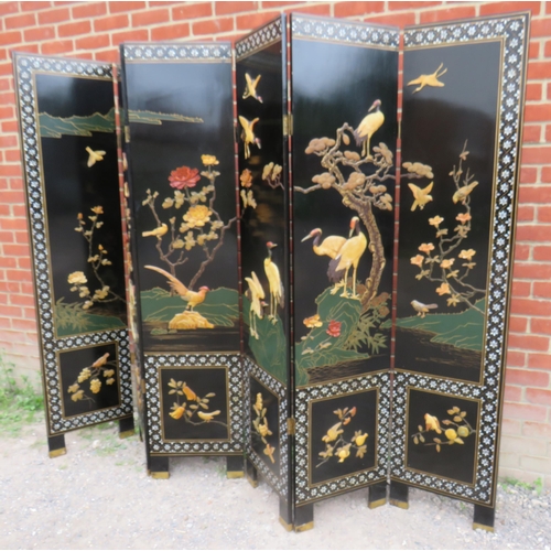 800 - A vintage Japanese seven section folding screen, ornately decorated with mother of pearl inlay and w... 