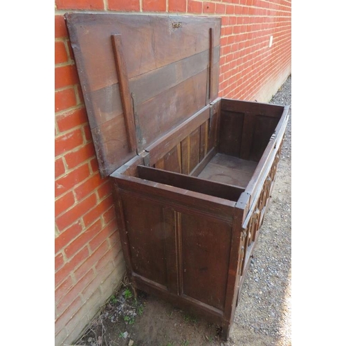 802 - A late 17th century oak mule chest with double fold carving & fielded panels to front and sides, emb... 