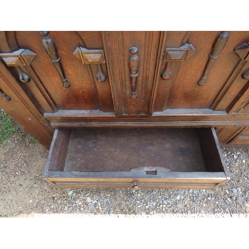 802 - A late 17th century oak mule chest with double fold carving & fielded panels to front and sides, emb... 