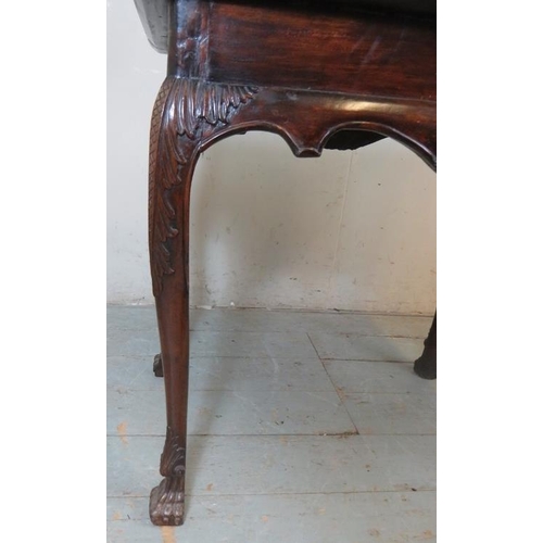 812 - A fine Georgian Irish silver table with a dished top, shape frieze carved with acanthus & shell deta... 