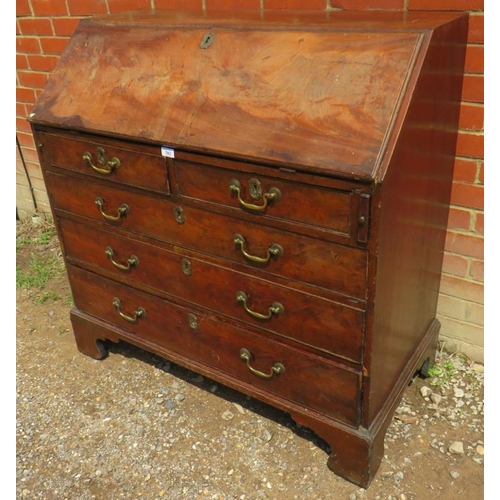 818 - A George III flame mahogany bureau with the fall front revealing a interior and two short over three... 