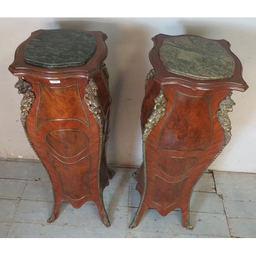 823 - A near pair of antique gilt metal mounted mahogany & burr walnut marble topped torcheres, featuring ... 