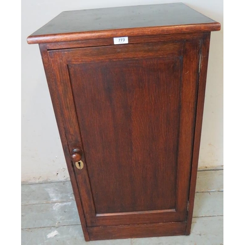 826 - An early 20th century oak pot cupboard with green vinyl insert to top and two internal fitted shelve... 