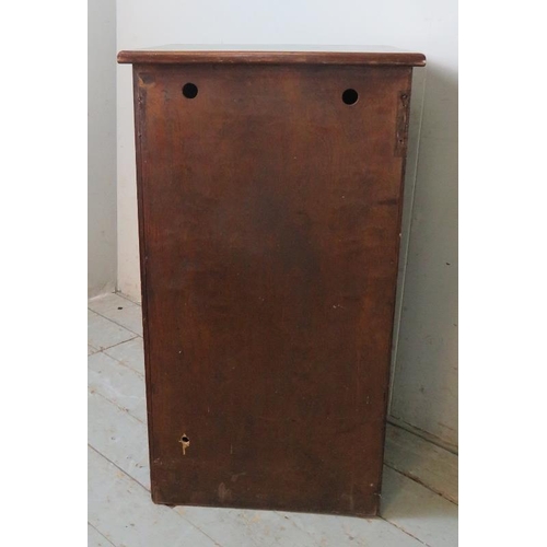 826 - An early 20th century oak pot cupboard with green vinyl insert to top and two internal fitted shelve... 