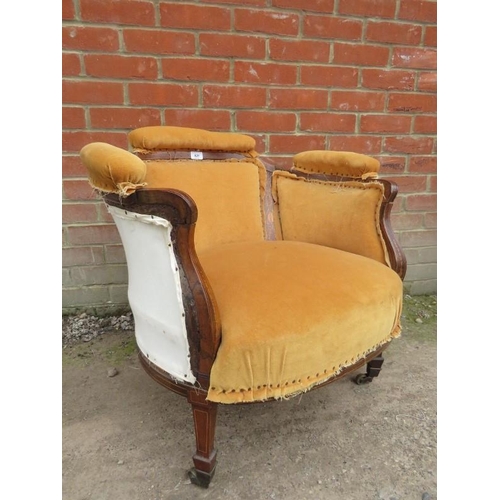 828 - An Edwardian inlaid tub chair terminating on tapering legs.
Condition report: Partially re-upholster... 