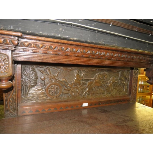 835 - A basically 17th Century oak tri-dresser dated 1665, with detailed panels depicting horse drawn carr... 