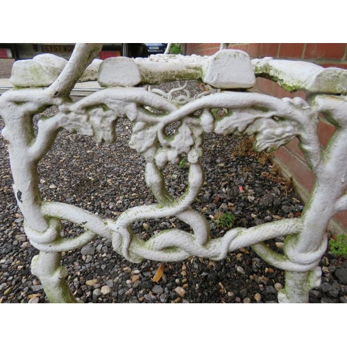 844 - A 19th century white painted cast iron garden bench in the manner of Coalbrookdale, depicting branch... 