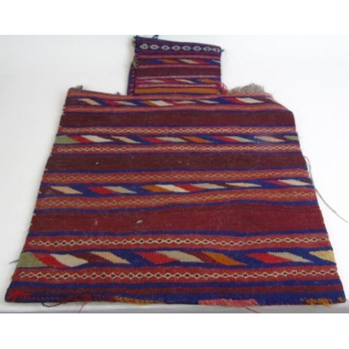 902 - An Afghan baluch salt bag mid 20th Century rug face & Kelim weave on back.
Estimated: £60-£80.