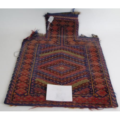 902 - An Afghan baluch salt bag mid 20th Century rug face & Kelim weave on back.
Estimated: £60-£80.