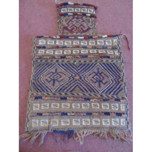 910 - An antique Afghan salt/saddle bag.
Condition report: In good condition.
Estimated: £30-£50.