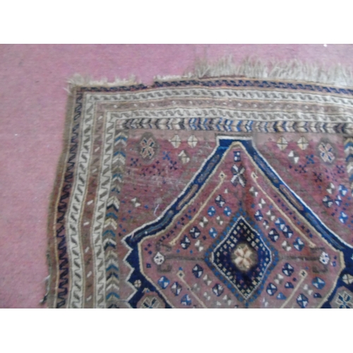 917 - An early 20th century Persian rug on brown ground, slightly a/f, 3.5' x 4.5' approx.
Estimated: £30-... 