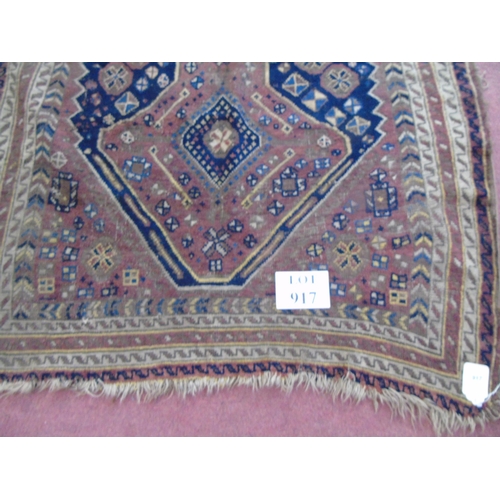 917 - An early 20th century Persian rug on brown ground, slightly a/f, 3.5' x 4.5' approx.
Estimated: £30-... 