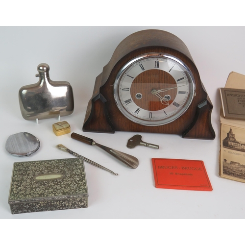 44 - A collection of post WWI postcards, a Smiths oak cased mantel clock, a pewter hip flask, a cigarette... 