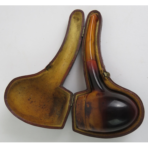 49 - An antique stubby Meerschaum tobacco pipe with amber type mouthpiece and beautifully aged bowl. Hing... 