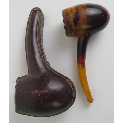 49 - An antique stubby Meerschaum tobacco pipe with amber type mouthpiece and beautifully aged bowl. Hing... 