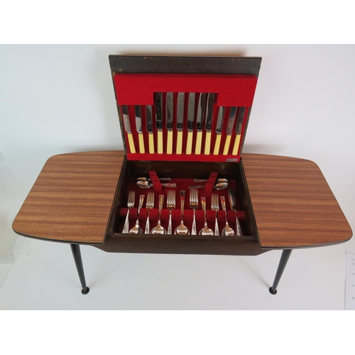 52 - A very cool mid Century Smith Seymour 58 piece canteen of cutlery in a bespoke table style canteen w... 