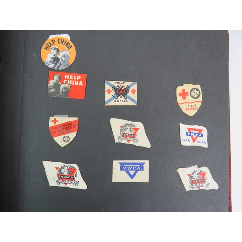 53 - Two albums containing a fascinating collection of charity flag day flags including many WWI and WW2 ... 