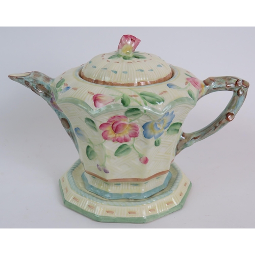 55 - A 1930's Beswick Ware basket weave teapot and stand, a Beswick 2 handled vase and a Crown Devon bee ... 