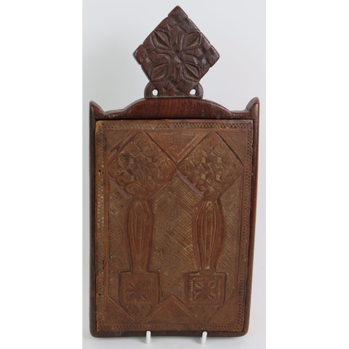 63 - A two part carved hardwood Ethiopian Christian icon depicting St George on one panel and the Madonna... 