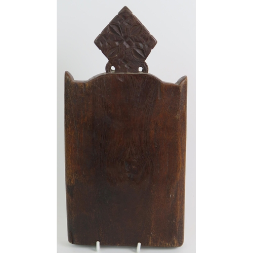 63 - A two part carved hardwood Ethiopian Christian icon depicting St George on one panel and the Madonna... 