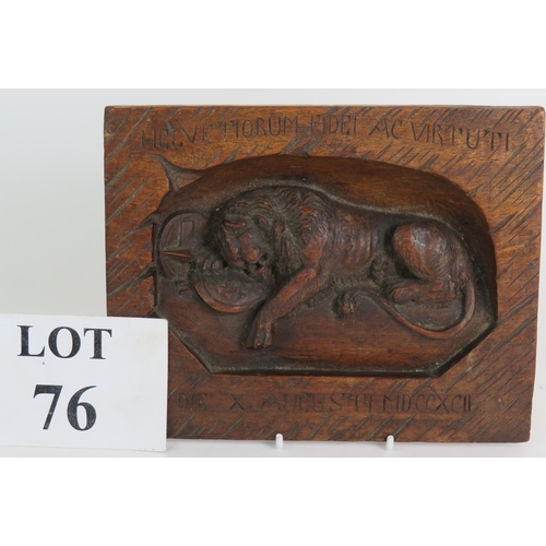 76 - A deeply carved oak Swiss black forest panel depicting The Lion of Lucerne, 21cm x 17cm. Condition r... 