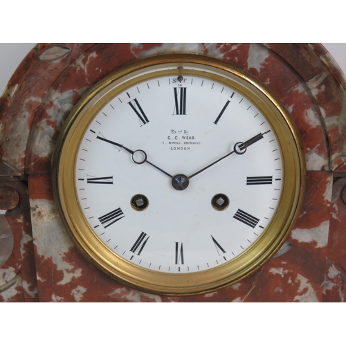 79 - A 19th Century red marble striking mantle clock by CC Webb Royal Exchange London with enamel dial an... 