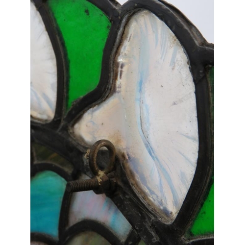 8 - A fine quality 20th Century Tiffany style plafonnier with multicoloured stained glass panels and a f... 