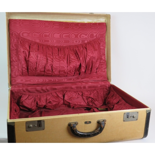 83 - A vintage four piece Victor Luggage travelling set including vanity case and hanging rail. All fully... 