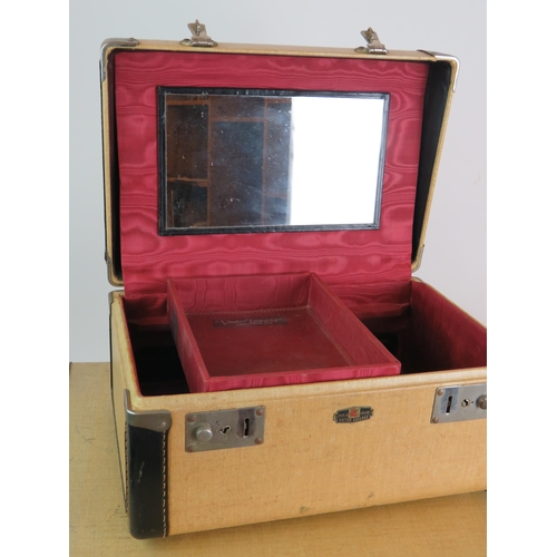 83 - A vintage four piece Victor Luggage travelling set including vanity case and hanging rail. All fully... 