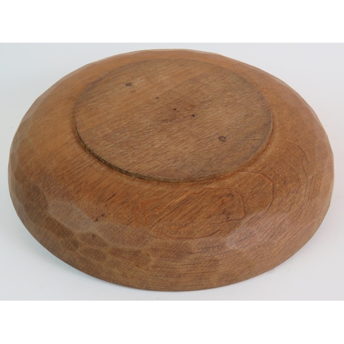 86 - A Robert Thompson Mouseman shallow oak bowl with central carved mouse and adze cut outer surface. Di... 