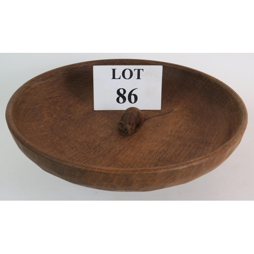 86 - A Robert Thompson Mouseman shallow oak bowl with central carved mouse and adze cut outer surface. Di... 