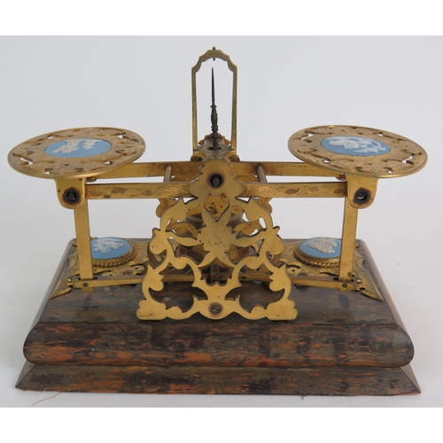 88 - A superb set of Victorian gilt brass postage scales by Sampson Mordon & Co with inset Jasperware med... 