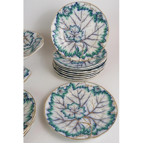 94 - An 18 piece Davenport Pottery dessert service with vine leaf decoration, date marked 1852. 12 plates... 