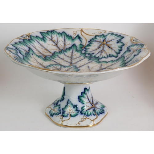 94 - An 18 piece Davenport Pottery dessert service with vine leaf decoration, date marked 1852. 12 plates... 