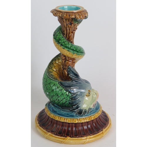 98 - A 19th Century Minton Majolica candlestick in the form of a wrythen stylised dolphin. Height 21cm. C... 