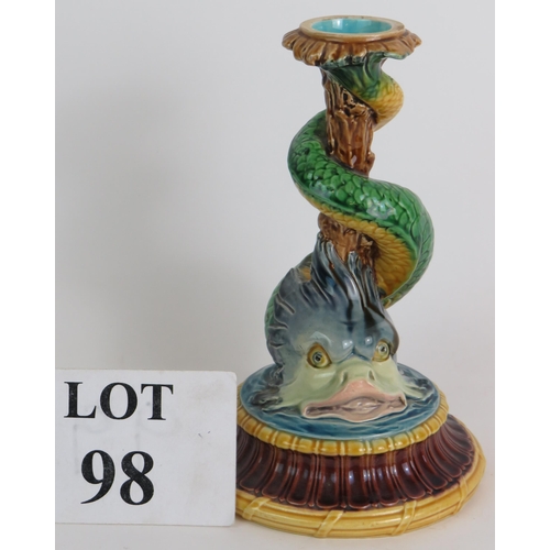 98 - A 19th Century Minton Majolica candlestick in the form of a wrythen stylised dolphin. Height 21cm. C... 