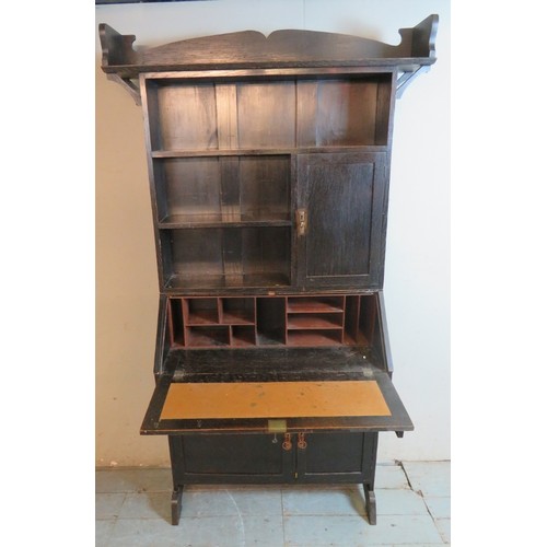 721 - A late 19th/early 20th century Arts & Crafts ebonised Liberty style oak bureau bookcase with shaped ... 