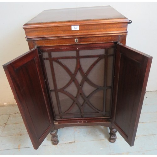 840 - A 1920's oak cased HMV gramophone with Garrard motor, raised on baluster turned supports. Complete w... 