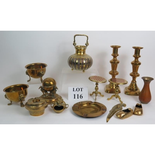 116 - A selection of mixed brassware including an Indo-Persian inlaid pot, pair of 19th Century candlestic... 