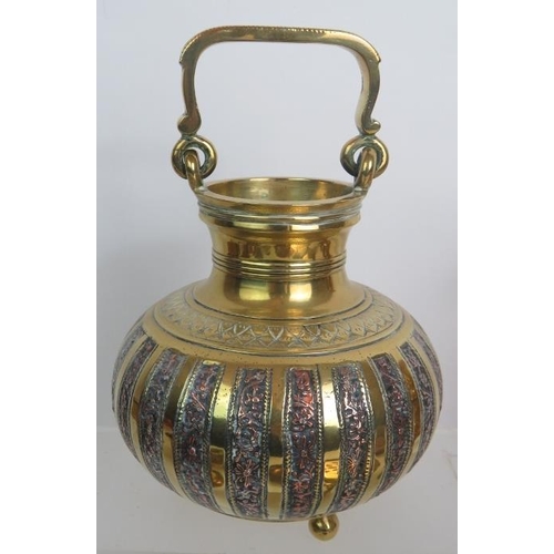 116 - A selection of mixed brassware including an Indo-Persian inlaid pot, pair of 19th Century candlestic... 