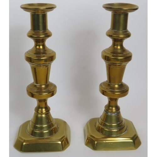 116 - A selection of mixed brassware including an Indo-Persian inlaid pot, pair of 19th Century candlestic... 