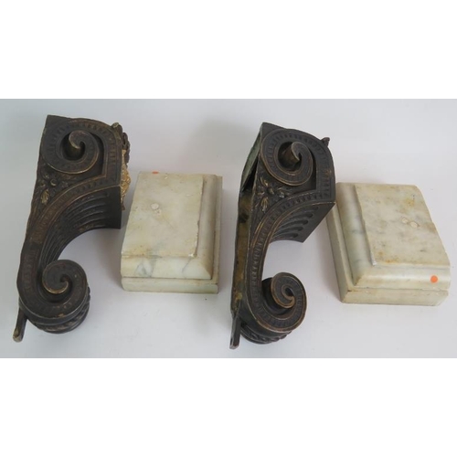 26 - A pair of antique heavy bronze and marble wall corbels, each with an Ormulu acanthus centre and of s... 