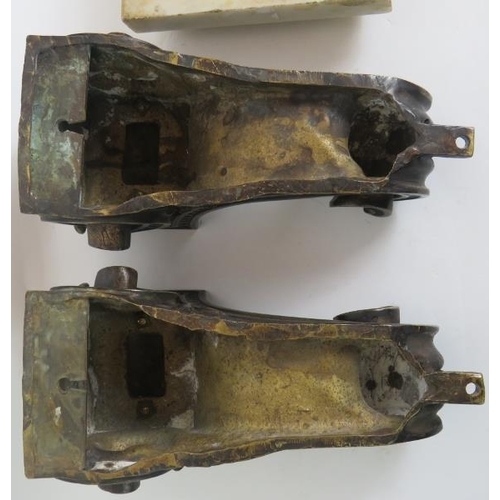 26 - A pair of antique heavy bronze and marble wall corbels, each with an Ormulu acanthus centre and of s... 