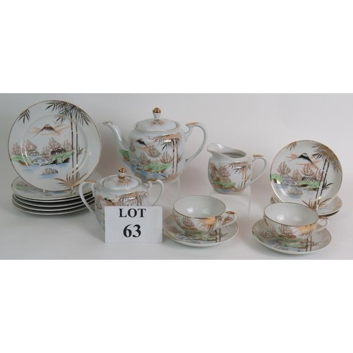 63 - A mid 20th Century  Japanese Kutani part tea set comprising 16 pieces including two Geisha lithophan... 
