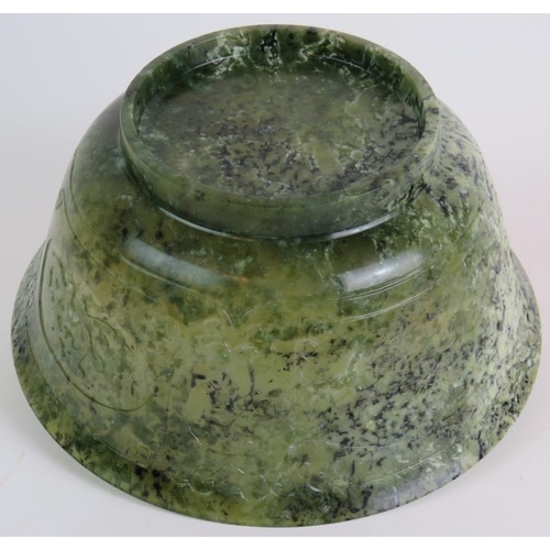 7 - A large Chinese carved spinach Jade bowl, 27cm in diameter, 12cm tall. Very finely carved to a thick... 