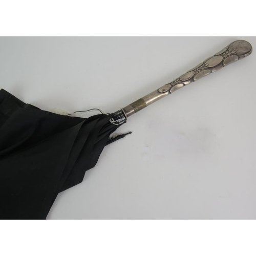 70 - An Art Nouveau continental silver handled umbrella/parasol c1920s with continental 800 marks. Overal... 